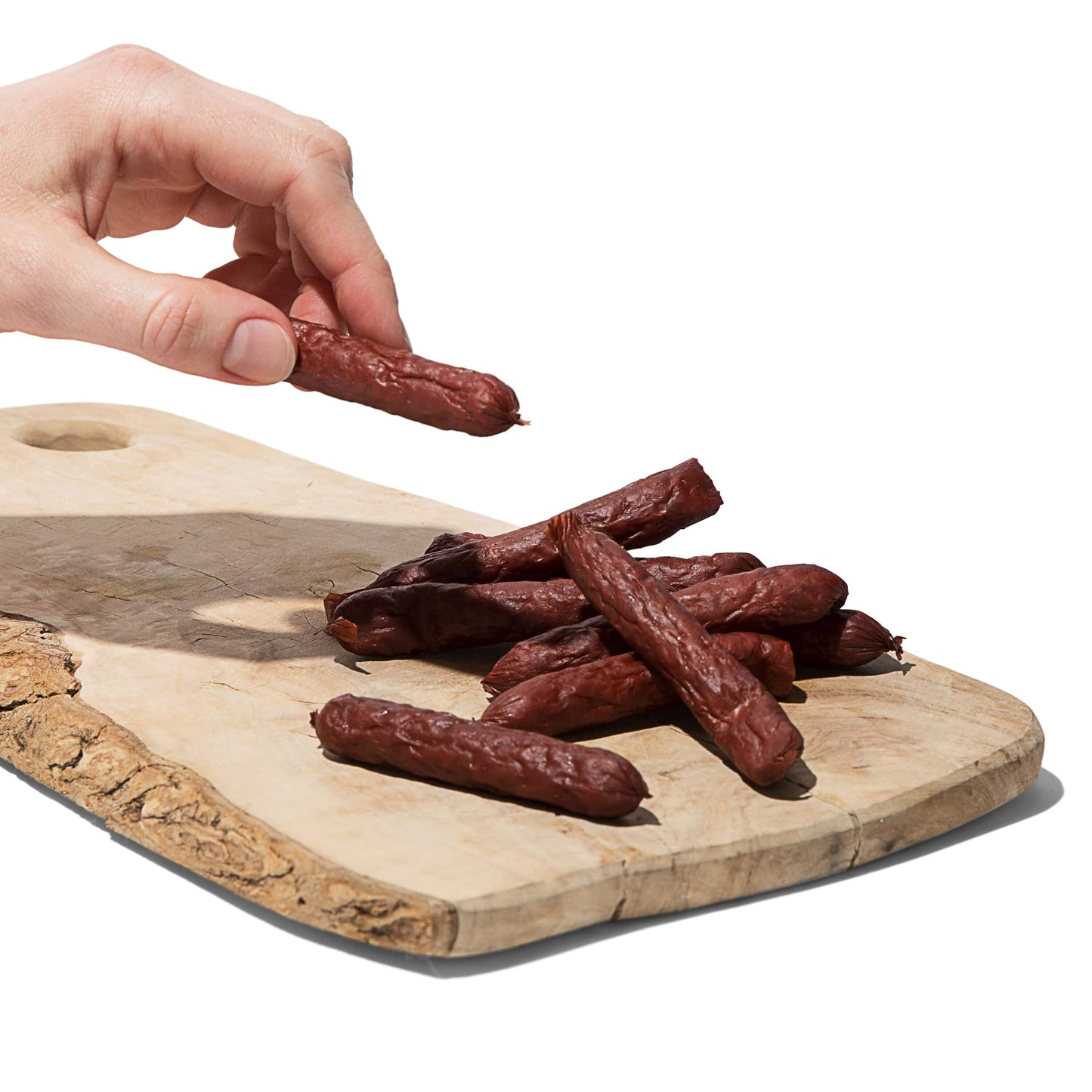 Country Archer Classic Smoked Sausages on wooden serving board